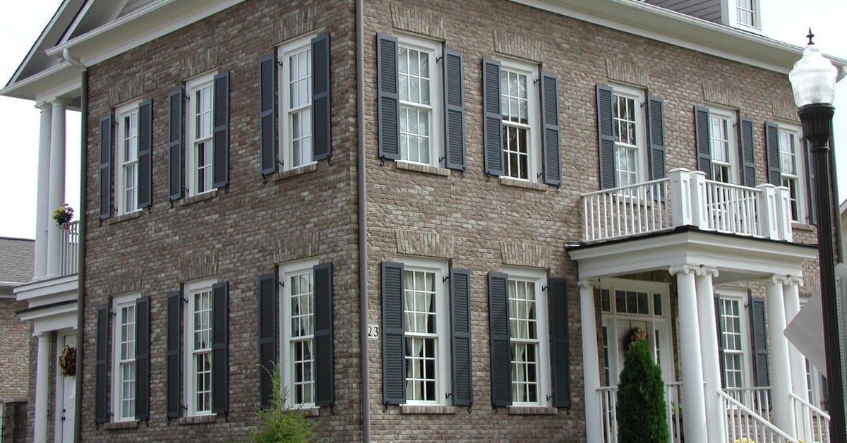 Composite vs. Wood Shutters: A Comparison for Homeowners